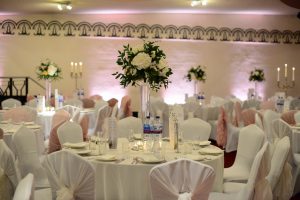White Spandex Chair Covers with Ivory and Blush Pink Chiffon Ruffle Hoods