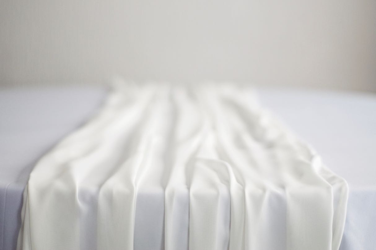 Ivory Chiffon Table Runner on White Table Cloth