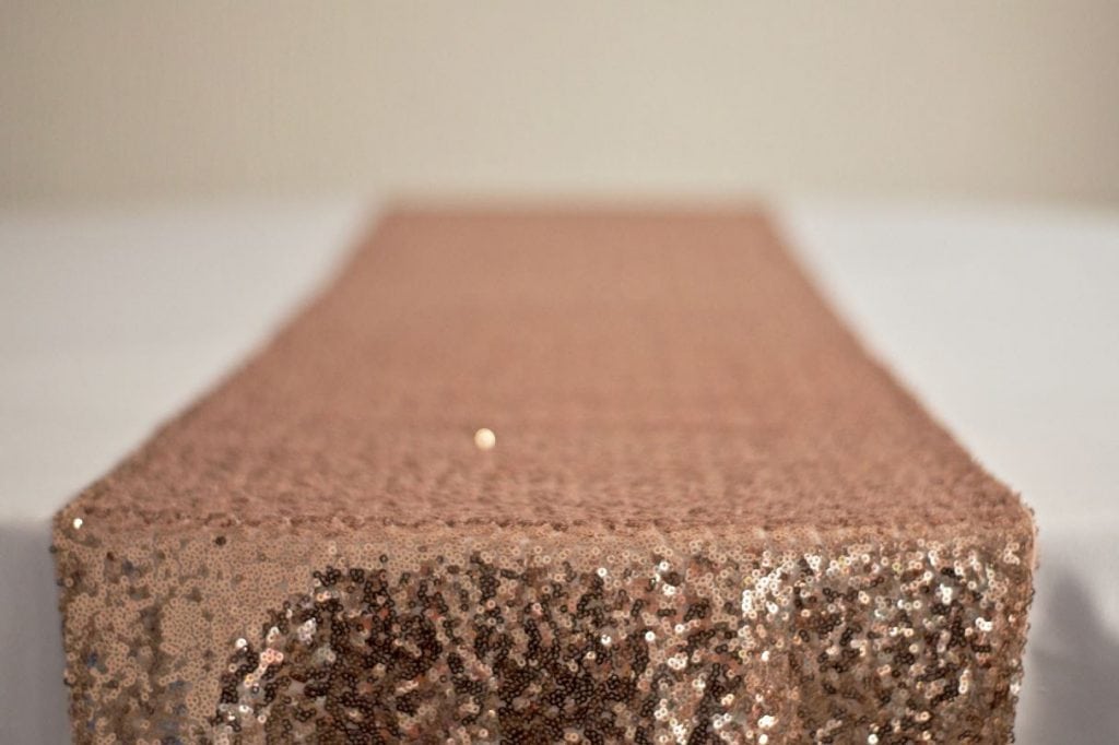 Rose Gold Sequin Table Runner on White Table Cloth